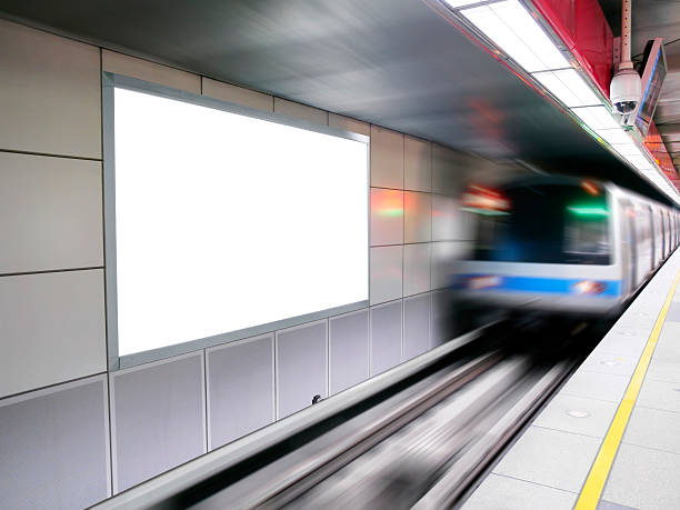 Blank billboard and train Blank billboard in subway station subway platform stock pictures, royalty-free photos & images