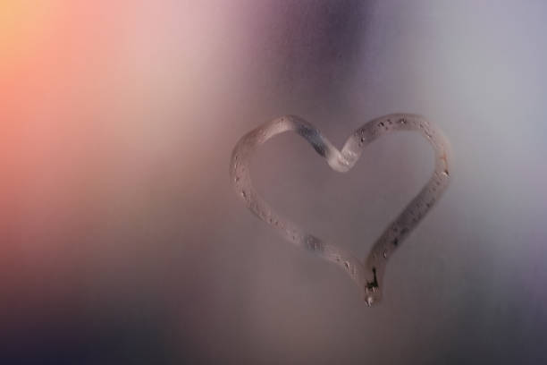 heart on wet mirror. concept love. - condensation steam window glass imagens e fotografias de stock