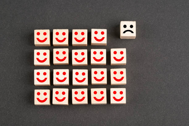 istock Wooden block cubes with people icons 1395705749
