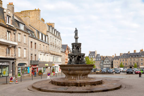 Plomée fountain in Guingamp Guingamp, France - May 04 2022: The Plomée fountain is a fountain located in Guingamp at the top of the Place du Centre, at the intersection of rue Notre Dame and rue Henry Kerfant."n guingamp brittany stock pictures, royalty-free photos & images