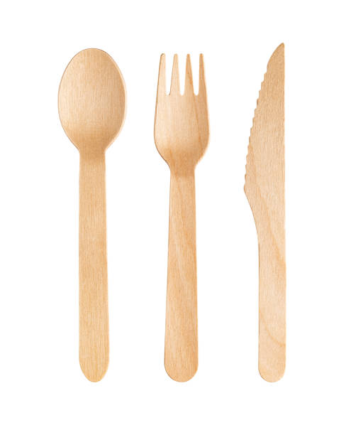 istock Disposable wooden cutlery on a white background. Environmentally friendly materials. 1395707406