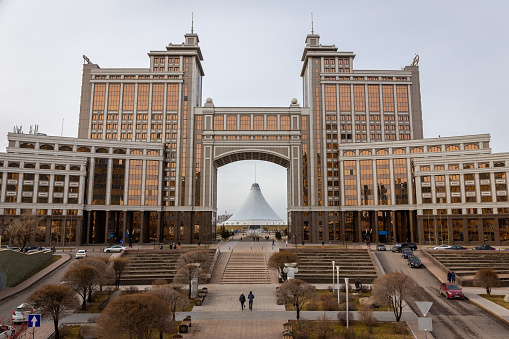 Nur Sultan (Astana), Kazakhstan, 11.11.21. Skyline of Nur Sultan (Astana) with monumental Gate (KazMunayGas JCR National Corporation), Khan Shatyr Entertainment Center and Nurjol Boulevard.