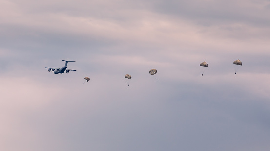 Paratroopers training over Calvi Bay in Corsica