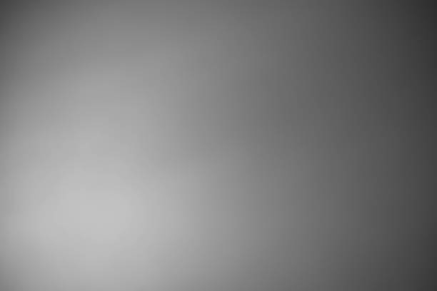 istock Dark black and gray blurred background has a little abstract light. 1395711306