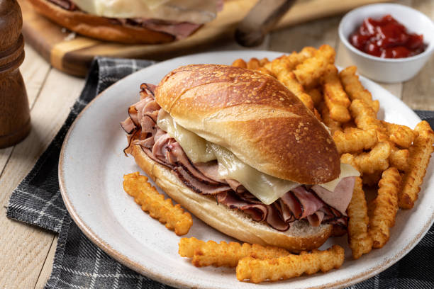 istock Hot ham and cheese submarine sandwich 1395717692