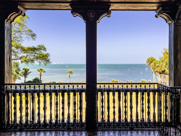 Framed view from balcony of historic coastal mansion in southwest Florida stock photo