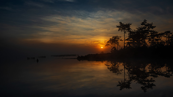 Sunrise over the river with foggy at Wang Kwang Reservoir Phu Kradueng National Park, Loei, Thailan