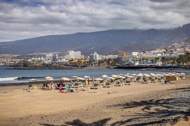 Amazing view of the sea waves on the coast of the island on a summer day. Seaside resort. Tourism and travel, vacation.