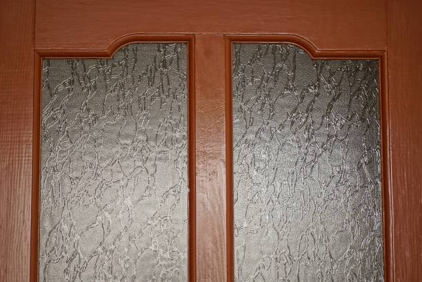 istock texture of brown boards and gray glass 1395728730