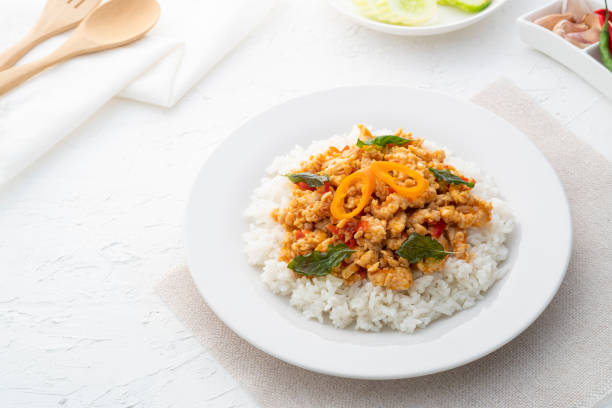 istock Rice topped with stir-fried minced chicken and basil 1395728990