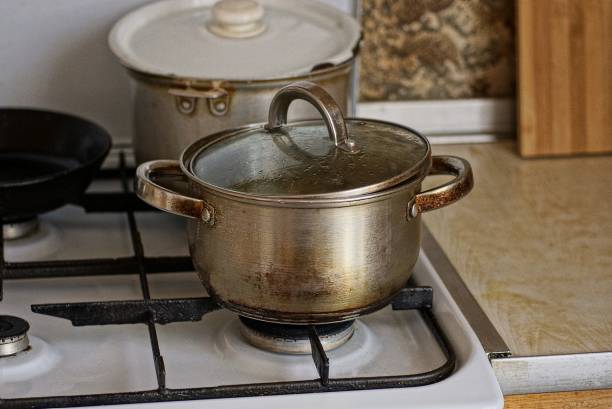 istock a one gray dirty metal saucepan 1395729082
