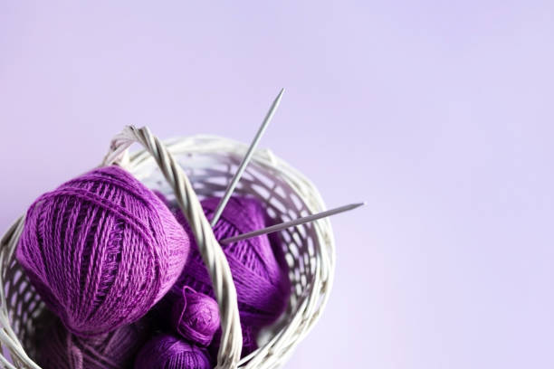 istock Balls of thread in a basket 1395729338