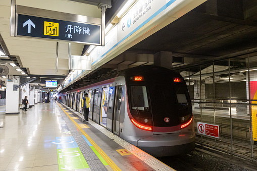 Hong Kong - May 4, 2022 : MTR Hyundai Rotem EMU at the East Rail Line Hung Hom Station in Kowloon, Hong Kong. The cross-harbour extension of the East Rail Line will begin operations on May 15.