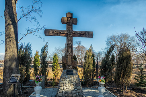 Worship cross on the territory of the Temple in honor of the icon of the Mother of God of All Who Sorrow Joy. Photo taken in Chelyabinsk, Russia.