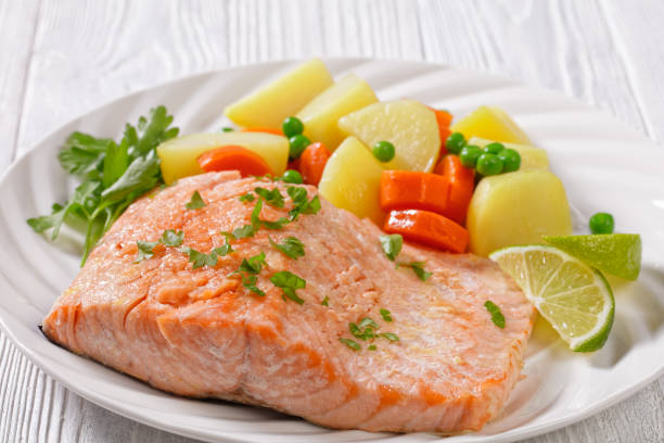 istock Multi Cooker salmon, carrots, peas and potatoes 1395731893