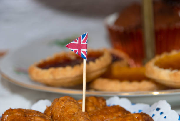 istock Platinum  jubilee  celebration  tea  party  food  with  union jack flags 1395734703