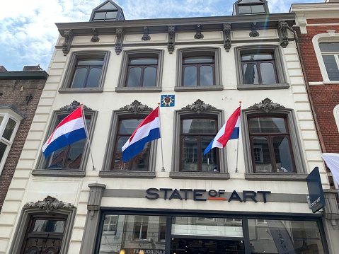 Sittard, May 05, 2022 - Dutch flags hanging in the streets to celebrate the WW2 Liberation  of the Netherlands.