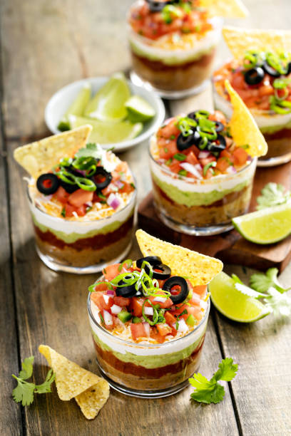 istock Seven layer dip in individual cups, mexican appetizer 1395736519