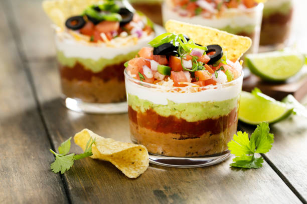istock Seven layer dip in individual cups, mexican appetizer 1395736533