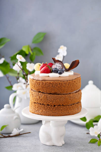 istock Chocolate cake for Mother's day with berries and chocolate topping 1395736616