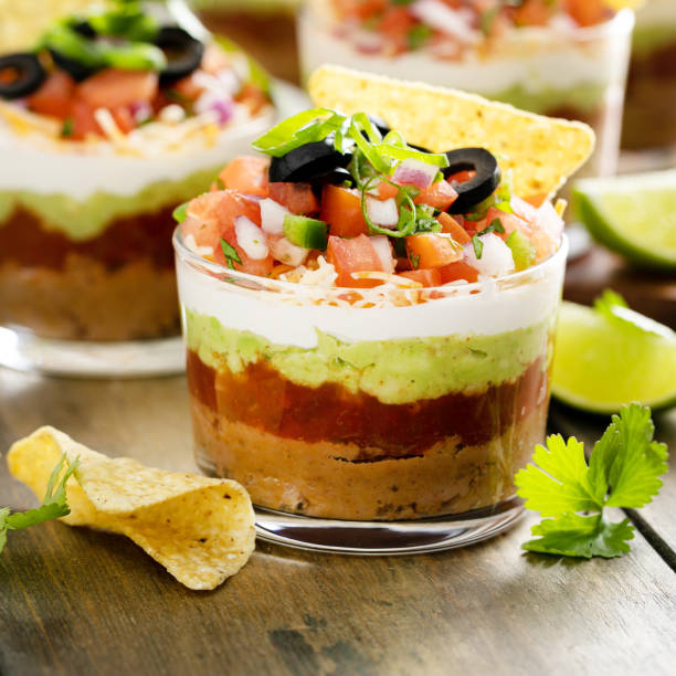 istock Seven layer dip in individual cups, mexican appetizer 1395736636