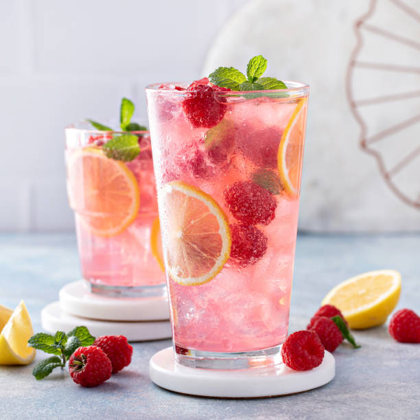 Spring or summer cold cocktail, raspberry lemonade stock photo