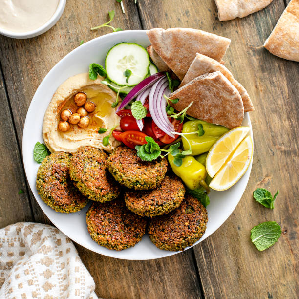 Baked falafel bowl with hummus and vegetables