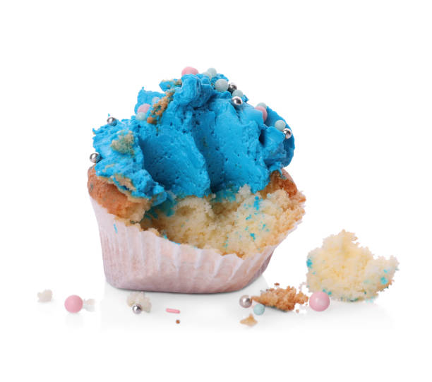 istock Failed cupcake with cream on white background. Troubles happen 1395741754