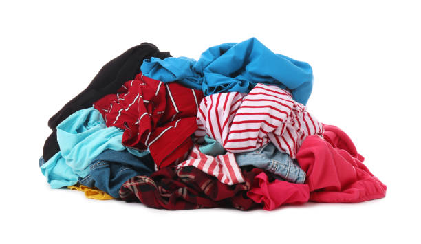 istock Pile of dirty clothes on white background 1395742136
