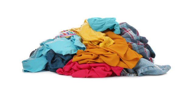 istock Pile of dirty clothes on white background 1395742191