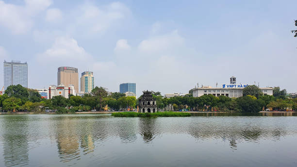 The Turtle Tower On Hoan Kiem Lake In Central Of Hanoi City, Vietnam. Hanoi, Vietnam - April 13, 2022 : The Turtle Tower On Hoan Kiem Lake In Central Of Hanoi City. ho guom stock pictures, royalty-free photos & images