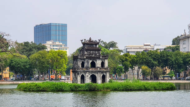 The Turtle Tower On Hoan Kiem Lake In Central Of Hanoi City, Vietnam. Hanoi, Vietnam - April 13, 2022 : The Turtle Tower On Hoan Kiem Lake In Central Of Hanoi City. ho guom stock pictures, royalty-free photos & images