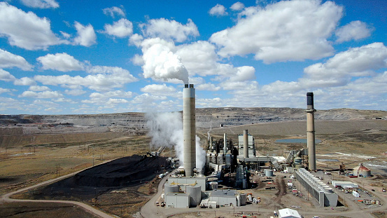 Coal Power Plant Creating Electricity. Coal power plants release tons of CO2 into Earth's atmosphere adding to pollution.