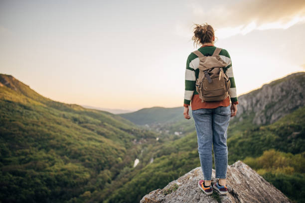istock Woman high on mountain 1395746939