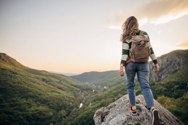 istock Woman high on mountain 1395747940
