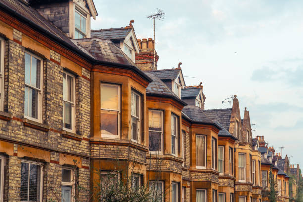 Facade of the famous pastel colored houses in Notting Hill, London, England