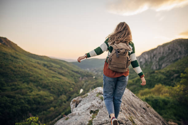 istock Woman high on mountain 1395748404