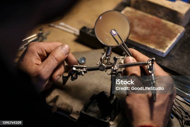 Jeweller Examining A Gemstone Stock Photo - Download Image Now - Jewelry, Quality Control, Gemstone