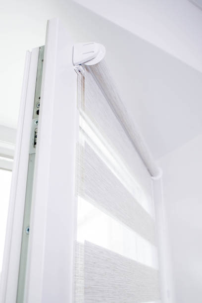 istock Window roller duo system day and night. Close up on roll curtains indoor. 1395753645