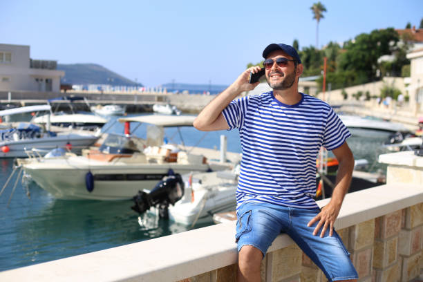 istock Sailor in a marina 1395755088