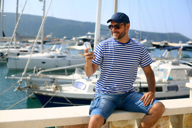 istock Sailor in a marina 1395755180