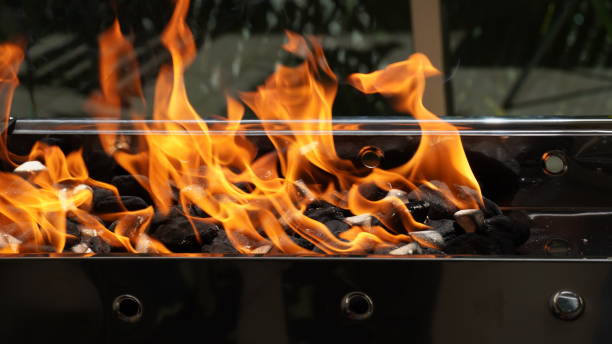 istock Empty Barbecue Flaming Grill Close Up With Bright Flames 1395755342