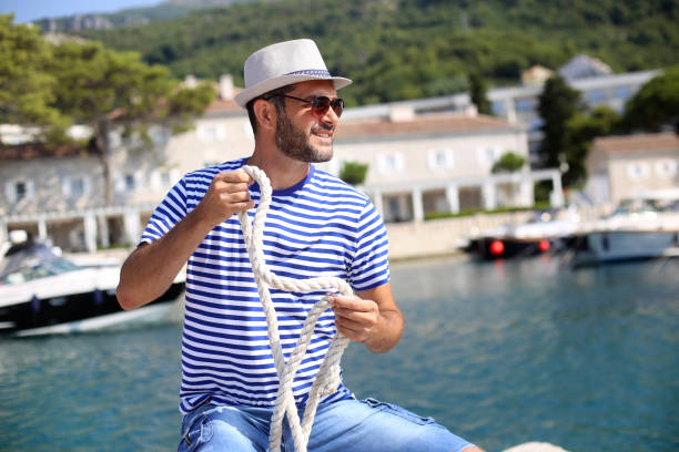 istock Sailor in a marina 1395756001