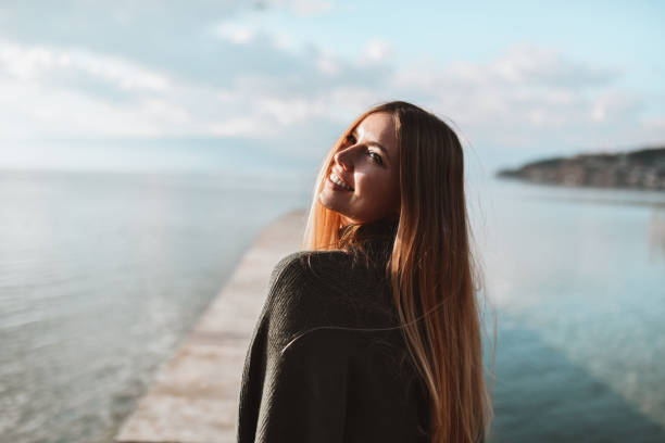 istock Lake And Spring Sun For Female Beauty 1395756196
