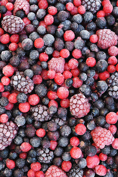 Close up of frozen mixed fruit  - berries stock photo