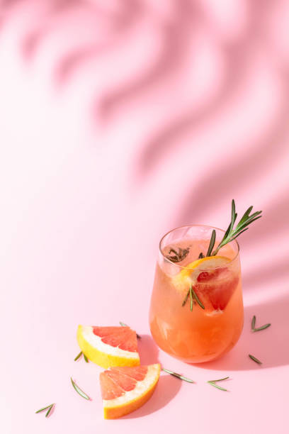 istock Summer cocktail with grapefruit, rosemary, and ice. 1395760539