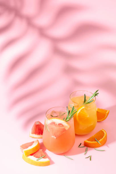 istock Summer cocktails with grapefruit, orange, rosemary, and ice. 1395760544