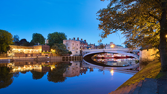 Lendal Bridge reflecting in the River Ouse.