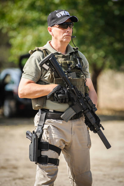 istock Full armed swat special forces army soldier in combat uniform 1395764898