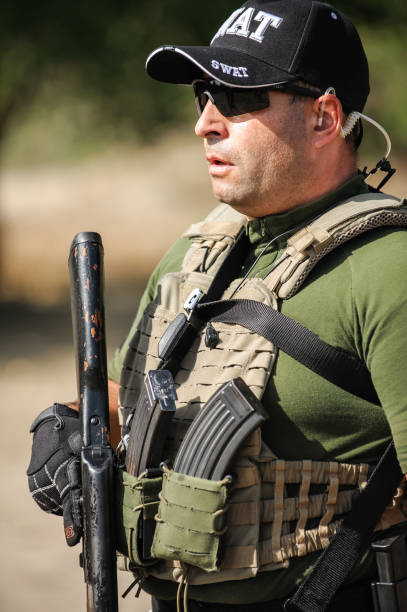 istock Full armed swat special forces army soldier in combat uniform 1395764930